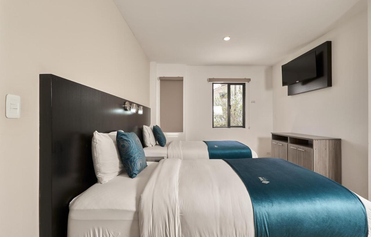 Hotel & Suites En Cuenca, Venue Batan Extérieur photo