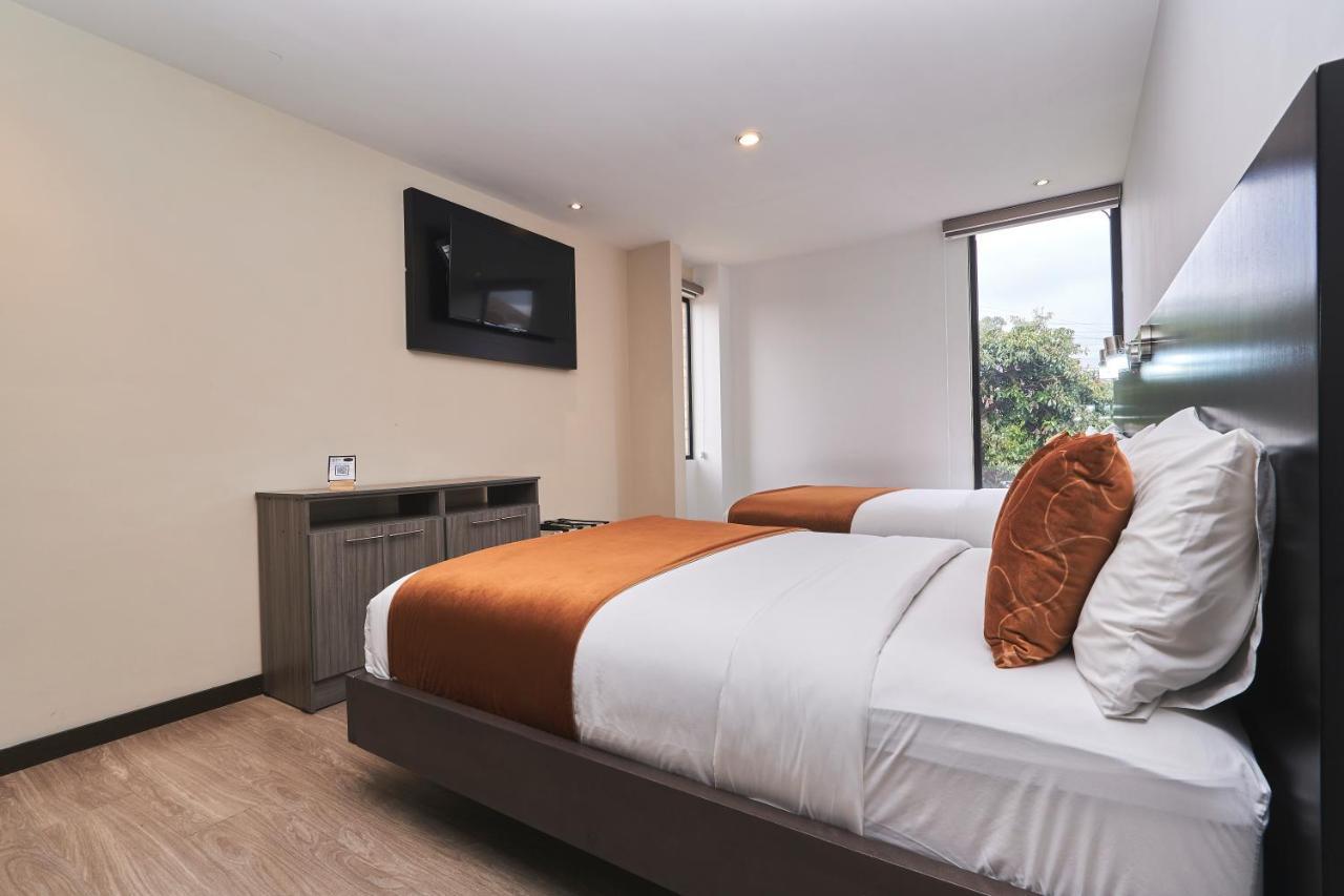 Hotel & Suites En Cuenca, Venue Batan Extérieur photo